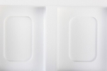 Styrofoam Sheets of different shapes on white background. Pieces of white styrofoam close up. Crumbled styrofoam pieces isolated on white background 