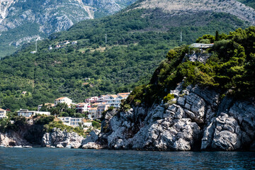 Scenic rocks and ancient town in Montenegro with amazing mountain nature view from Adriatic sea. Mediterranean landscape