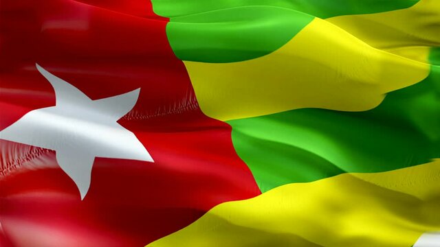 Togo flag video. National 3d Togolese Flag Slow Motion video. Togo Flag Blowing Close Up. Togolese Flags Motion Loop HD resolution Background Closeup 1080p Full HD video. Togo flags waving in wind vid