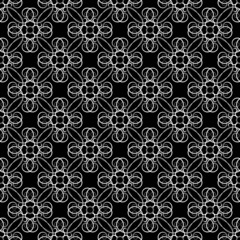 Diagonal squares with white flowers on black