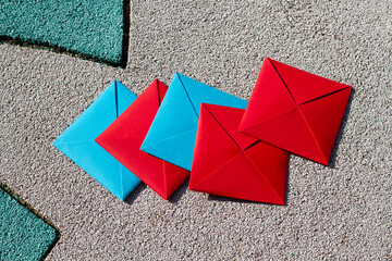Korean traditional outdoor game tool ‘Ttakji’ on the playground. Top view.  
