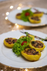 Baked potatoes with baked julienne inside