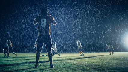 American Football Teams Compete: Substitution Athlete Warrior Stands on Field Ready to Win the...