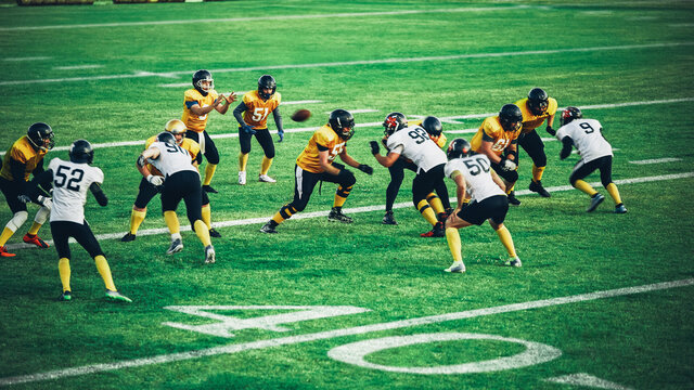 American Football Teams Start Game: Professional Players, Aggressive Face-off, Tackle, Pass, Fight for Ball and Score. Warrior Competition Full of Brutal Energy, Power, Skill. - Powered by Adobe