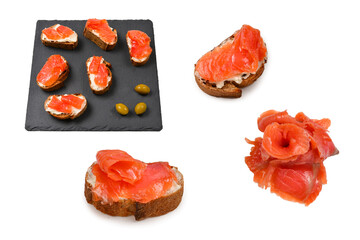 Salmon on a bread with cream isolated on white.