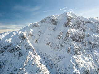 Snow covered mountain peak winter panorama landscape