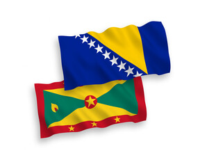 National vector fabric wave flags of Grenada and Bosnia and Herzegovina isolated on white background. 1 to 2 proportion.
