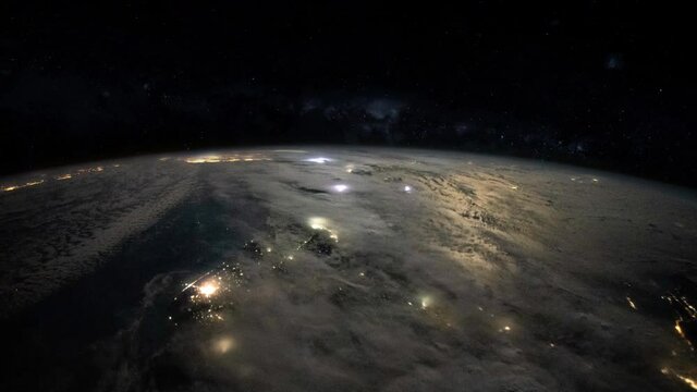 Stormy weather on planet earth night lights satellite view from space time lapse, thunder and lightning. Based on images furnished by Nasa