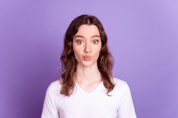 Obraz premium Photo of young pretty girl pouted lips send air kiss romantic date isolated over purple color background