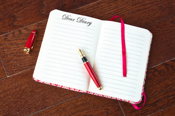 Blank entry of diary and fountain pen with 