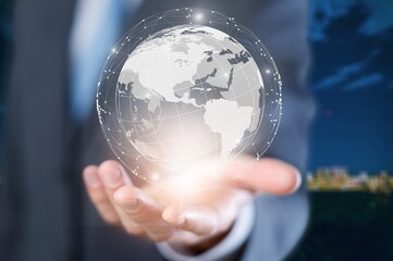 Global communication network concept. Environmental technology. Hand hold a globe