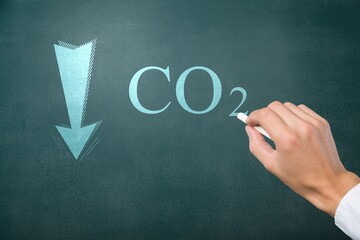Reducing CO2 levels. Graph of the decline in carbon dioxide levels on the board