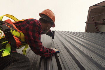 Roofer Construction worker install new roof,Roofing tools