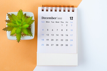 December 2022 desk calendar with tree pot.