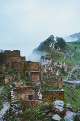 The ancient abandoned ruined city of Gamsutl high in the mountains - 470880462