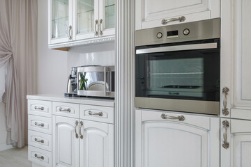 Interior of the modern luxure kitchen  in studio apartments in minimalistic style