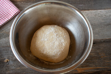 fresh yeast dough in a bowl