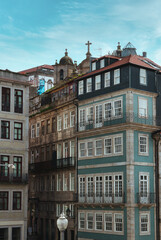 Fototapeta na wymiar Old historical houses of Porto. Rows of colorful buildings in the traditional architectural style, Portugal