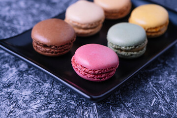 Close-up of some macarons of different flavors.