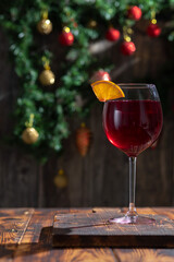 glass of red wine on table