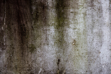 Concrete textured background or an abstract dirty cement wall with slippery shades stains on the surface