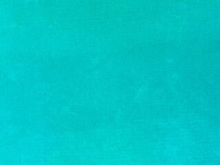 Fototapeta na wymiar turquoise old velvet fabric texture used as background. Empty turquoise fabric background of soft and smooth textile material. There is space for text..