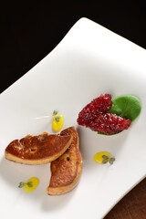 Fine dining, Roasted foie gras with cherry sauce on the plate
