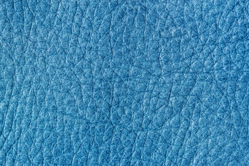 Genuine leather texture, denim blue color, trendy background. Modern backdrop