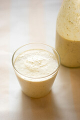 Banana, coconut water, chia seeds and pollen smoothie