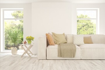 Stylish room in white color with sofa and summer landscape in window. Scandinavian interior design. 3D illustration