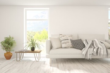 White living room with sofa and summer landscape in window. Scandinavian interior design. 3D illustration