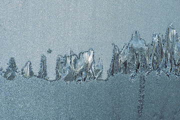 Frosty pattern on the window pane.