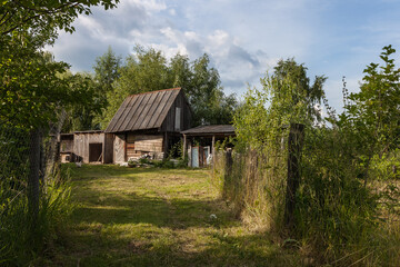 Old wooden barn. Rural courtyard