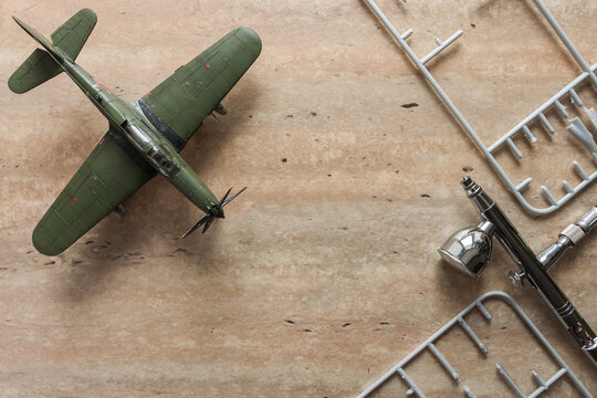 Scale model of the airplane fighter with details. Plastic assembly kit