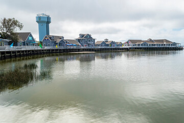 Duck a town on N C outer banks Horizontal Photo, Photograph is the boardwalk starting point of a 1...
