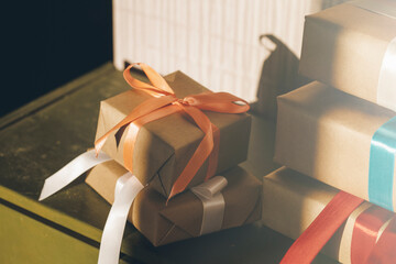 gifts in kraft packaging on a light background
