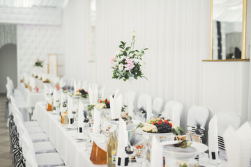 Interior of a restaurant prepared for wedding ceremony