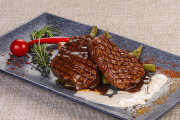 Grilled beef steak served pepper