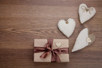 The heart is made of cotton fabric and a gift. valentine's day.The concept of decoration, sewing, needlework.
