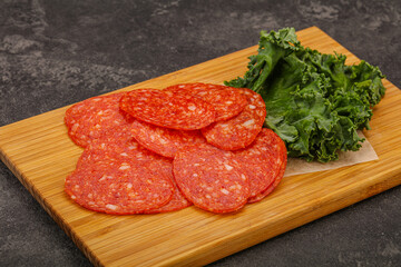 Italian spycy pepperoni sausage slices