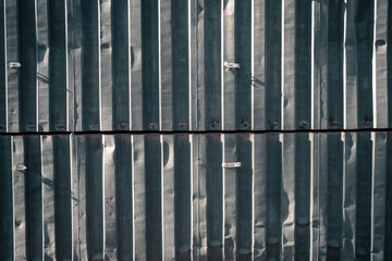 Side wall of an old iron container. Container wall texture