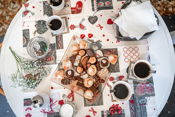 coffee and pastries on the table, flat lay