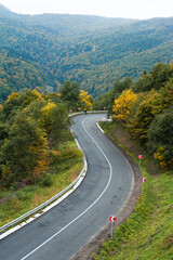 Asphalt road in the autumn mountain