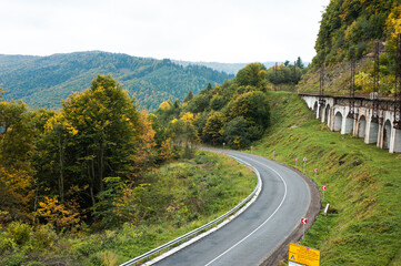 Asphalt road in the autumn mountain