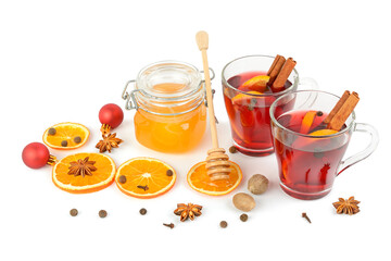 Mulled wine, honey and Christmas decor on white background