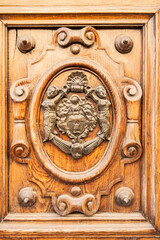 Decorative detail of a wooden door