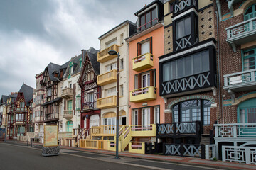 Fototapeta na wymiar Old, colourful and typical seaside houses in the town of Mer-les-Bains in France