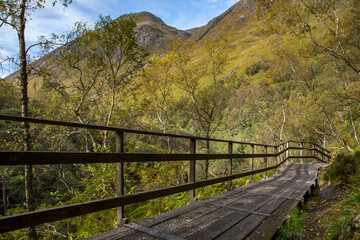 Fototapeta na wymiar Walkway in the Nevis Gorge near Steall Falls in the Scottish Highlands, UK.