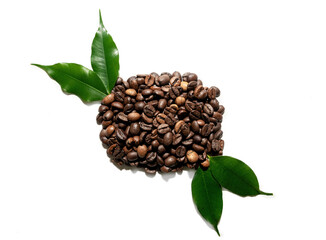 Handful of roasted coffee beans on white background