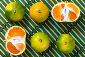 Citrus fruits background orange mandarin. Flatlay composition. Top view.